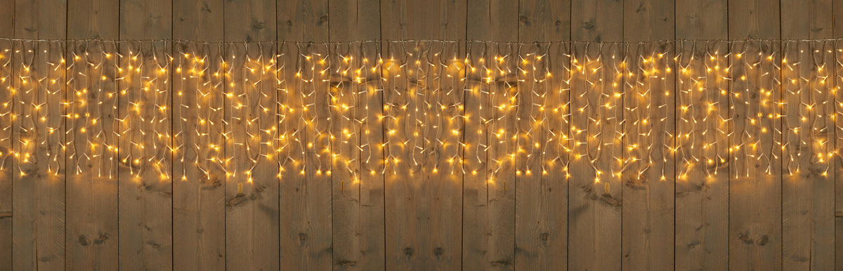 Lichtgordijn outdoor 100 Stränge 1000l/500x50cm LED warmweiß - 5m Anschlusskabel transparent - IP44 Trafo an / 8/16h Timer / aus