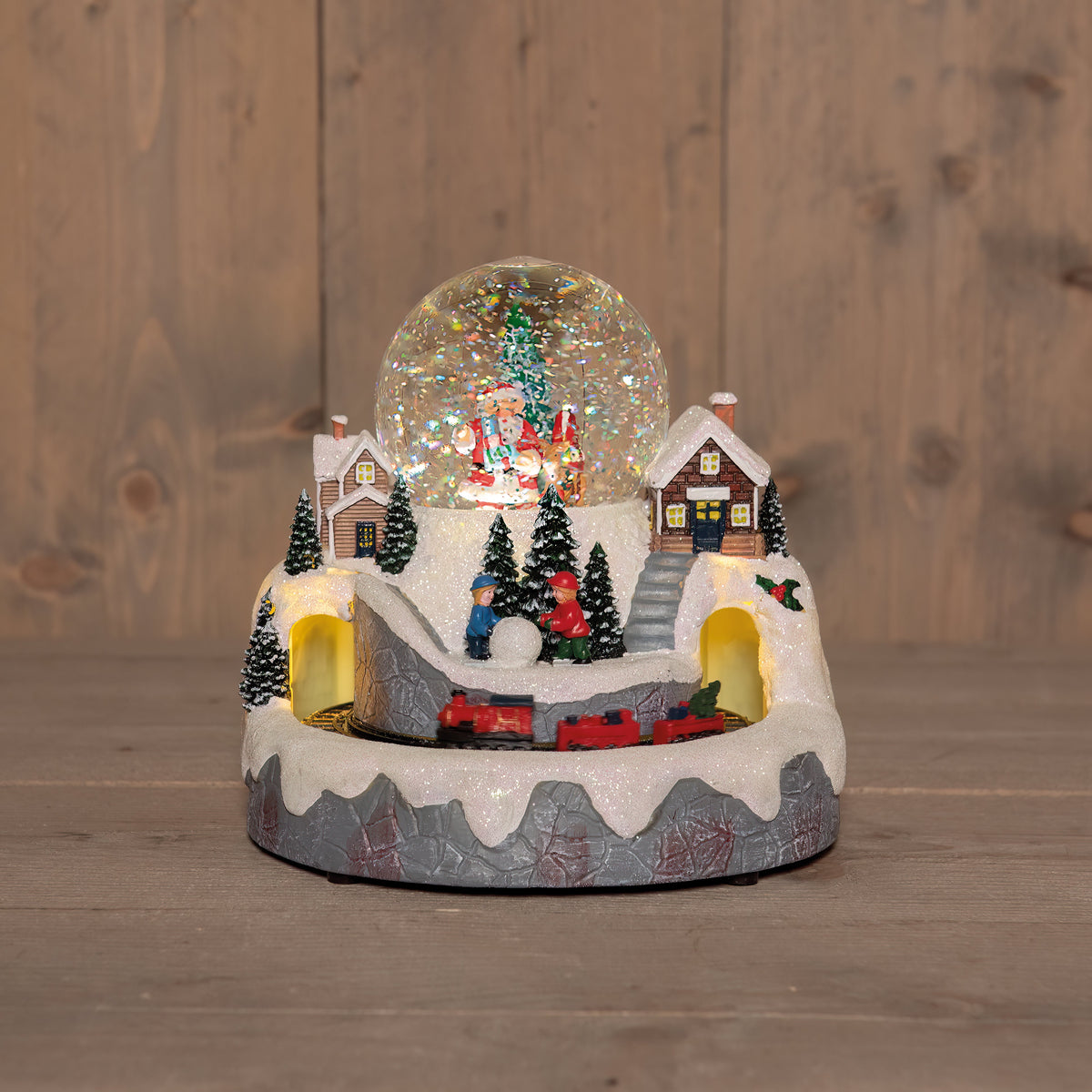 landschap met trein kerstman in glitterwaterbal  op 3aa batterij met dc aansluiting 24x23,5cm warm wit
