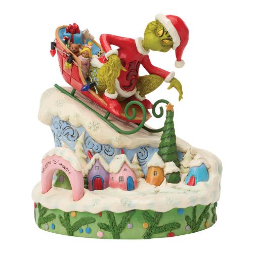 the grinch on small sled figurine - the grinch by jim shore