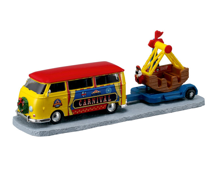 towing van with carnival ride