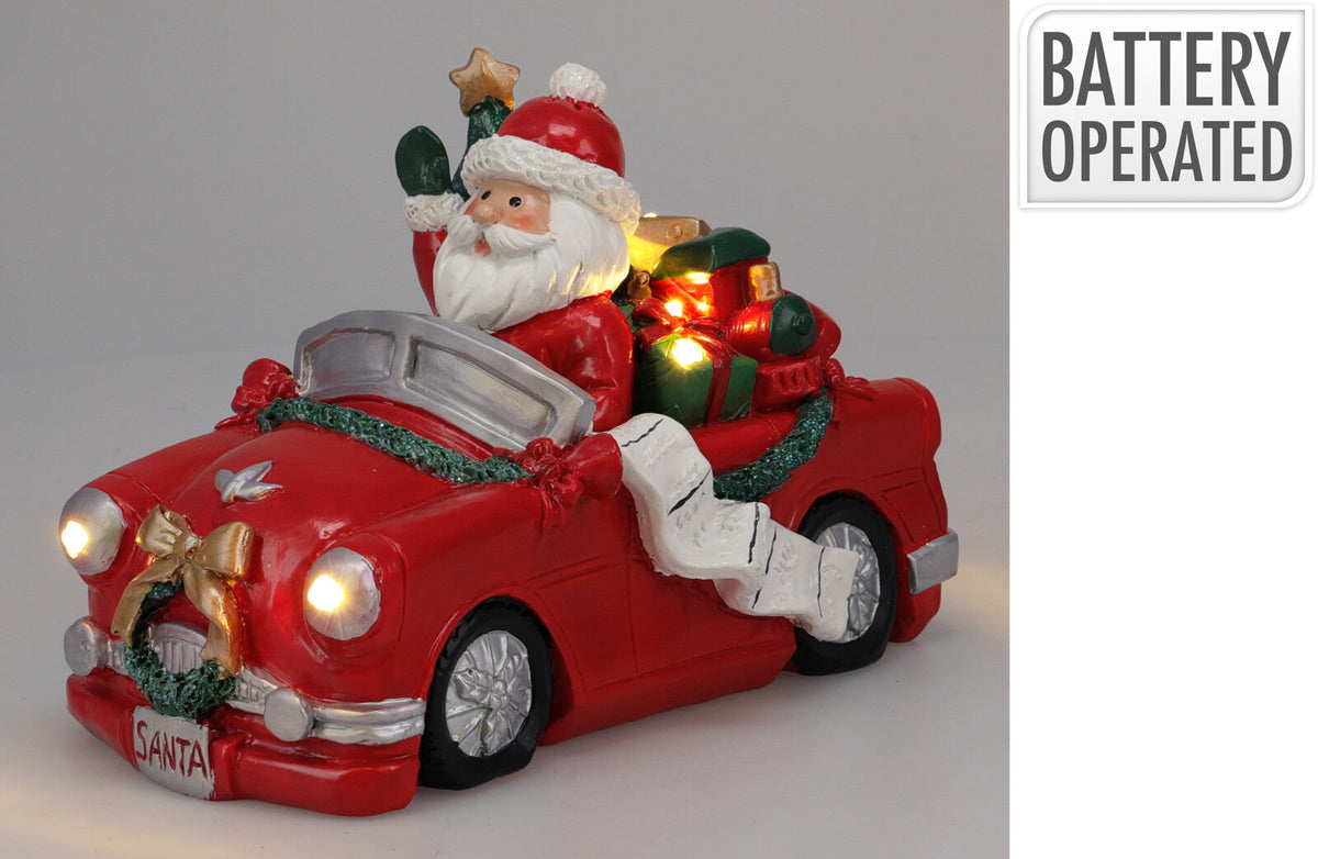 kerstman in auto 22x12x14cm met led