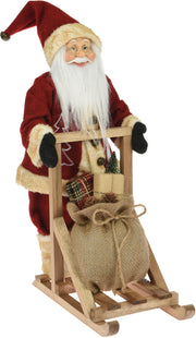 kerstman op slee staand bordeaux